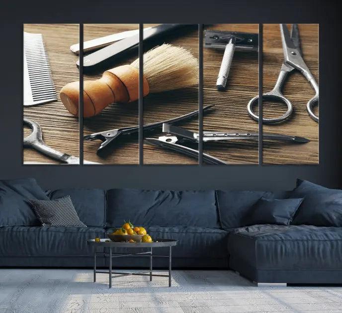 The Barber Tools Wall Art Canvas Print elegantly showcases the barbering profession with illustrations of tools like scissors, a brush, and a comb.