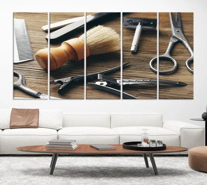 The Barber Tools Wall Art Canvas Print elegantly showcases the barbering profession with illustrations of tools like scissors, a brush, and a comb.