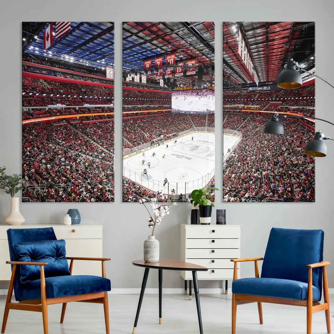 The living room showcases the Barton Malow Little Caesars Arena Detroit Wall Art Canvas Print, depicting the hockey and basketball stadium in vibrant colors. The museum-quality canvas ensures high-resolution printing for an impressive display.