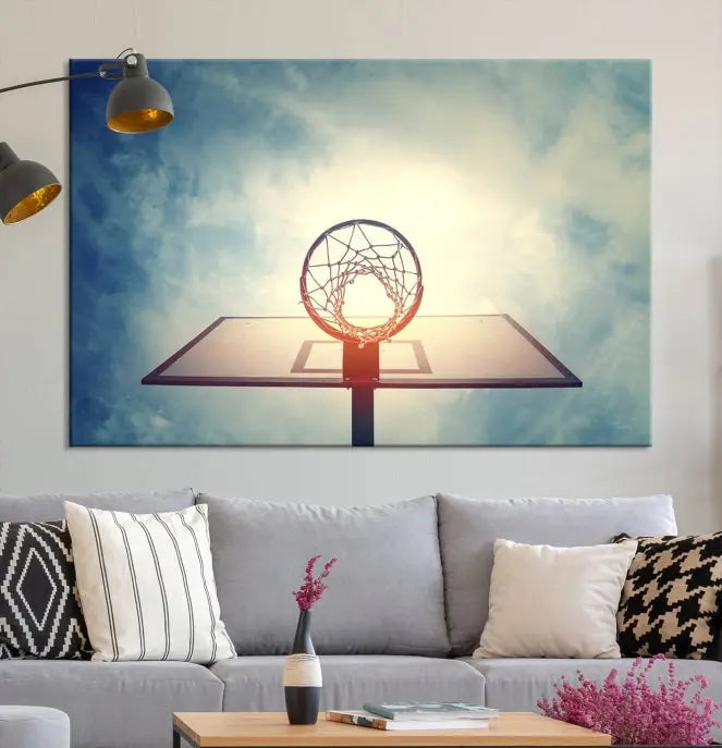 A triptych wall art titled "Basketball Hoop Wall Art Canvas Print | Sport Wall Art" features a basketball hoop set against a cloudy sky. It is printed on museum-quality canvas with gallery wrapping.