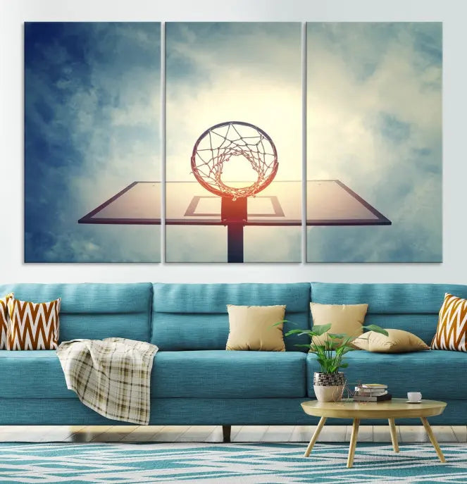 A triptych wall art titled "Basketball Hoop Wall Art Canvas Print | Sport Wall Art" features a basketball hoop set against a cloudy sky. It is printed on museum-quality canvas with gallery wrapping.