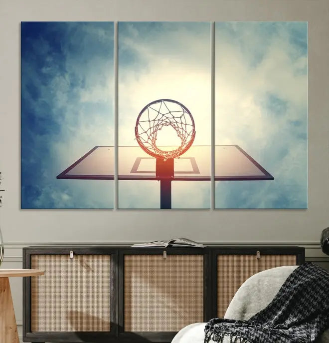 A triptych wall art titled "Basketball Hoop Wall Art Canvas Print | Sport Wall Art" features a basketball hoop set against a cloudy sky. It is printed on museum-quality canvas with gallery wrapping.