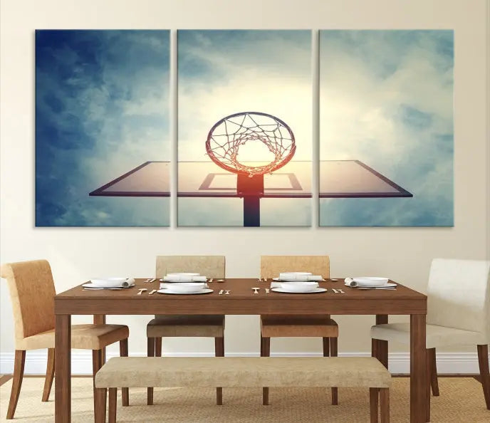 A triptych wall art titled "Basketball Hoop Wall Art Canvas Print | Sport Wall Art" features a basketball hoop set against a cloudy sky. It is printed on museum-quality canvas with gallery wrapping.