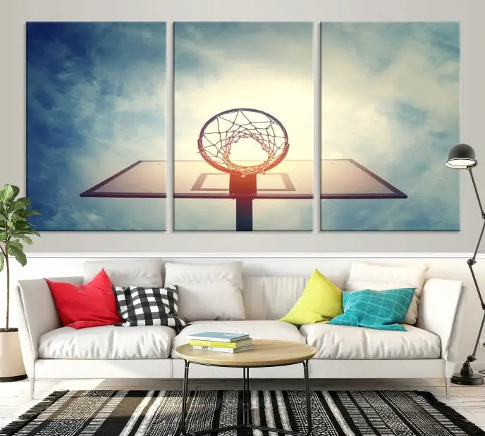 A triptych wall art titled "Basketball Hoop Wall Art Canvas Print | Sport Wall Art" features a basketball hoop set against a cloudy sky. It is printed on museum-quality canvas with gallery wrapping.