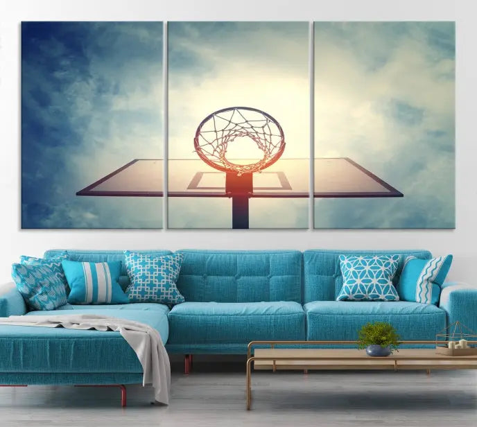 A triptych wall art titled "Basketball Hoop Wall Art Canvas Print | Sport Wall Art" features a basketball hoop set against a cloudy sky. It is printed on museum-quality canvas with gallery wrapping.