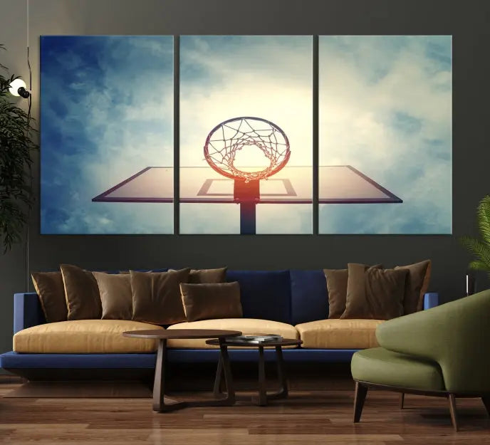 A triptych wall art titled "Basketball Hoop Wall Art Canvas Print | Sport Wall Art" features a basketball hoop set against a cloudy sky. It is printed on museum-quality canvas with gallery wrapping.