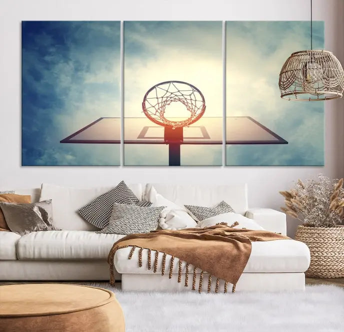 A triptych wall art titled "Basketball Hoop Wall Art Canvas Print | Sport Wall Art" features a basketball hoop set against a cloudy sky. It is printed on museum-quality canvas with gallery wrapping.