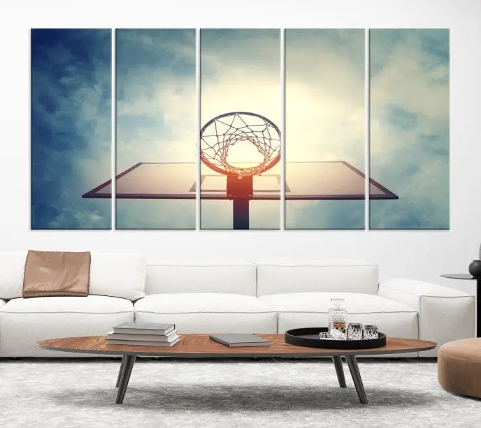 A triptych wall art titled "Basketball Hoop Wall Art Canvas Print | Sport Wall Art" features a basketball hoop set against a cloudy sky. It is printed on museum-quality canvas with gallery wrapping.