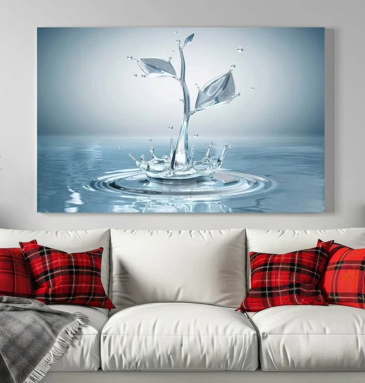 The living room features a three-panel wall art titled "Bathroom Wall Art Blue Leaf Canvas," showcasing water splash shapes that form plant-like designs on gallery-wrapped, museum-quality canvas.