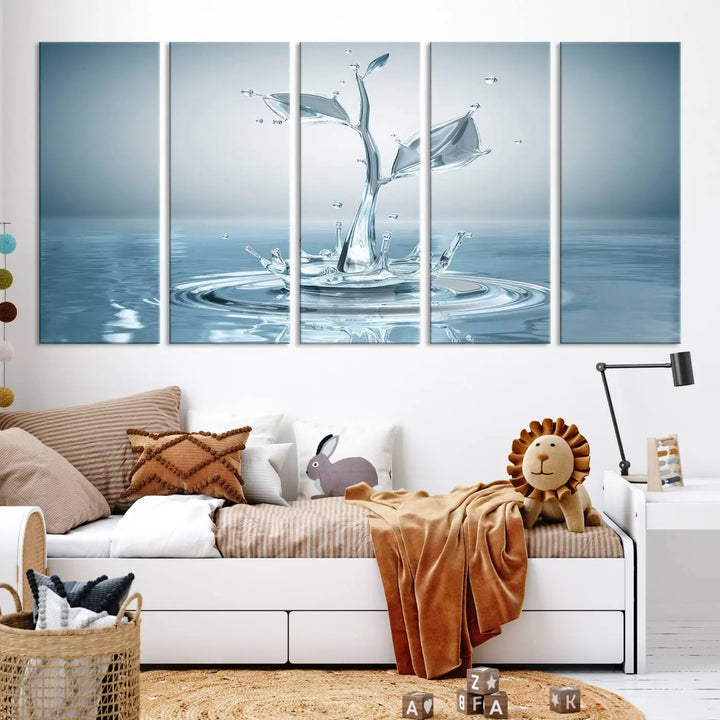 The living room features a three-panel wall art titled "Bathroom Wall Art Blue Leaf Canvas," showcasing water splash shapes that form plant-like designs on gallery-wrapped, museum-quality canvas.