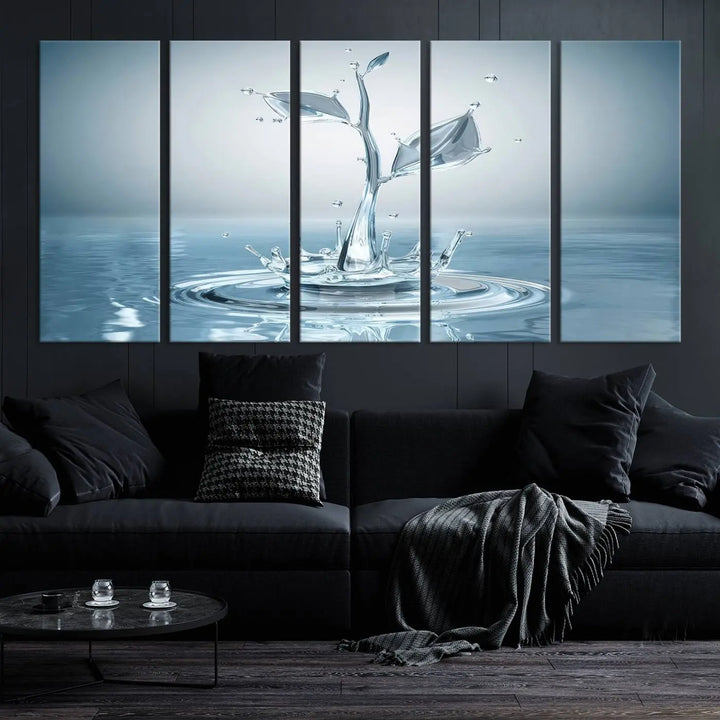 The living room features a three-panel wall art titled "Bathroom Wall Art Blue Leaf Canvas," showcasing water splash shapes that form plant-like designs on gallery-wrapped, museum-quality canvas.