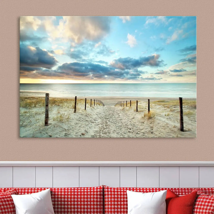 The Beach Ocean Sunset Sand Wall Art Canvas Print, renowned for its museum-quality and UV-protective coating, is elegantly displayed on a dark wall.