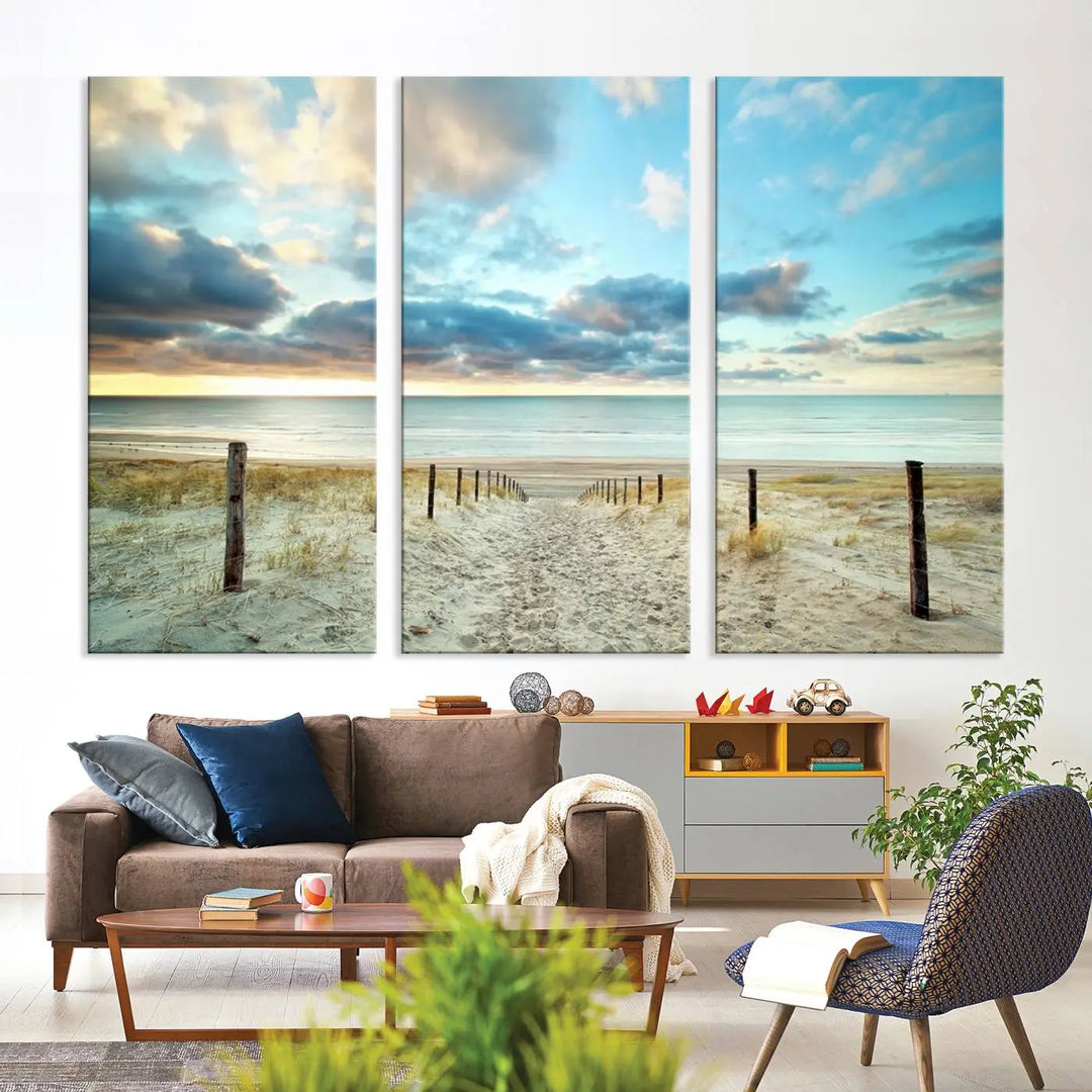 The Beach Ocean Sunset Sand Wall Art Canvas Print, renowned for its museum-quality and UV-protective coating, is elegantly displayed on a dark wall.