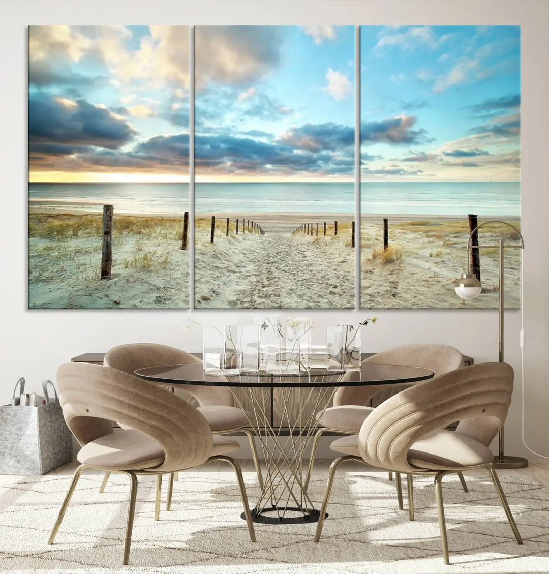 The Beach Ocean Sunset Sand Wall Art Canvas Print, renowned for its museum-quality and UV-protective coating, is elegantly displayed on a dark wall.