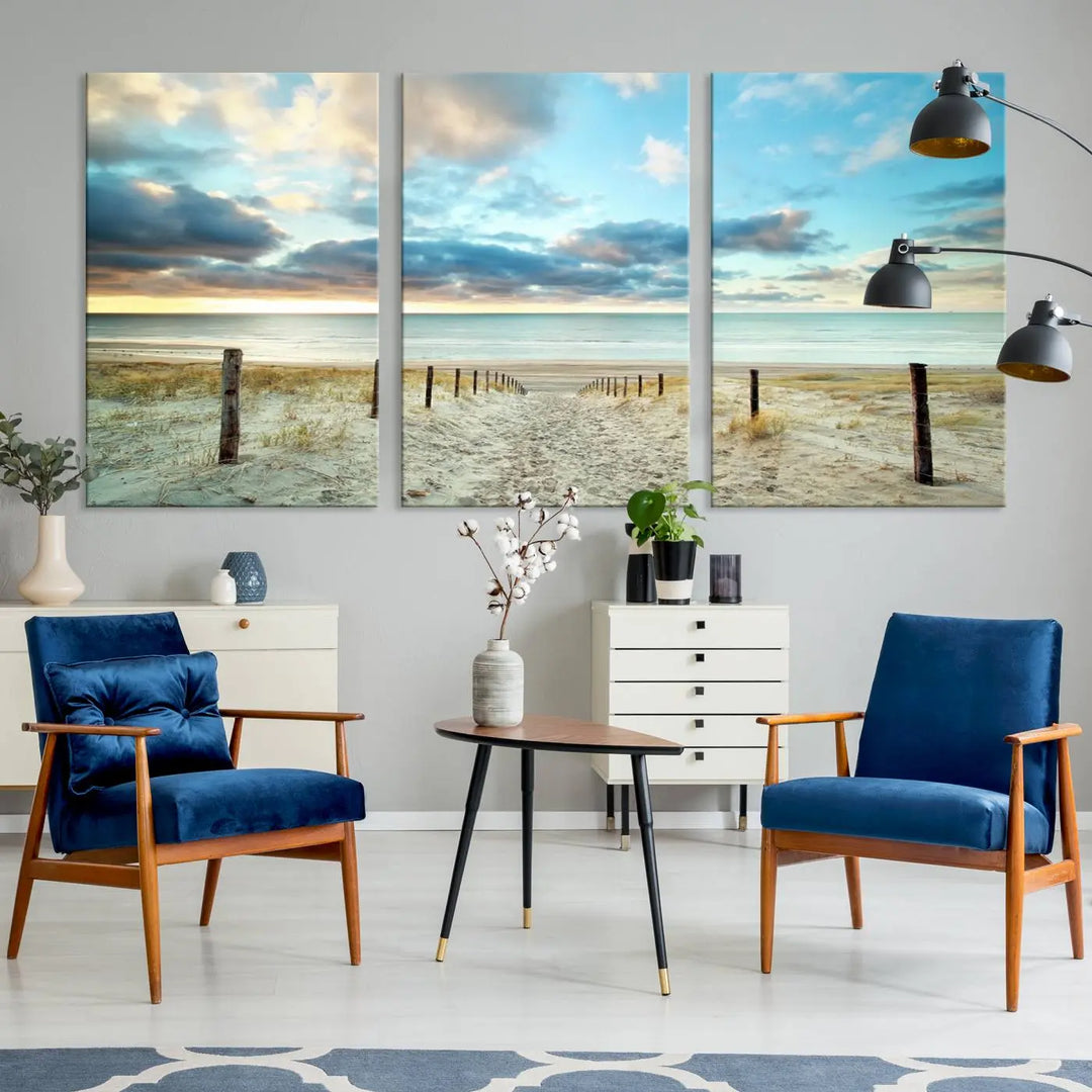 The Beach Ocean Sunset Sand Wall Art Canvas Print, renowned for its museum-quality and UV-protective coating, is elegantly displayed on a dark wall.