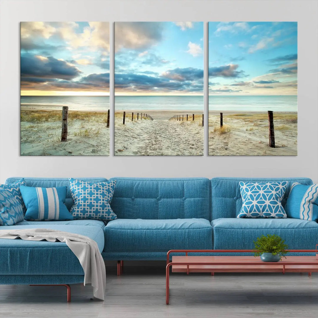 The Beach Ocean Sunset Sand Wall Art Canvas Print, renowned for its museum-quality and UV-protective coating, is elegantly displayed on a dark wall.