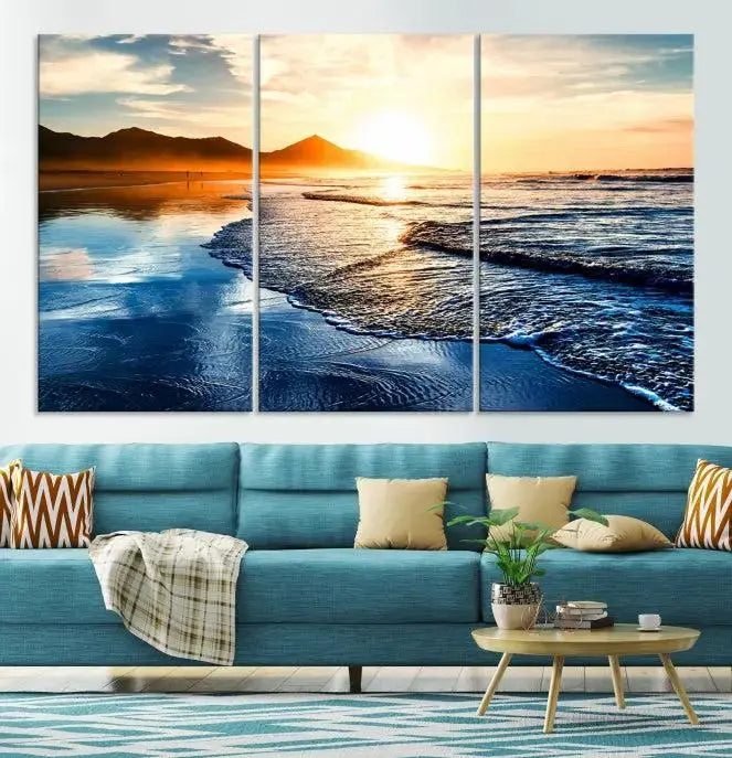 The Beach Ocean Sunset on the Sea Wall Art Canvas Print features a mesmerizing triptych of a beach sunset. Made from museum-quality polycotton canvas with a UV-protective coating, this ready-to-hang artwork will beautifully transform your space.