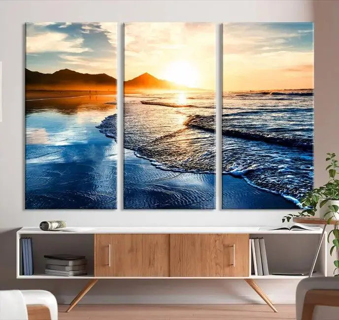 The Beach Ocean Sunset on the Sea Wall Art Canvas Print features a mesmerizing triptych of a beach sunset. Made from museum-quality polycotton canvas with a UV-protective coating, this ready-to-hang artwork will beautifully transform your space.