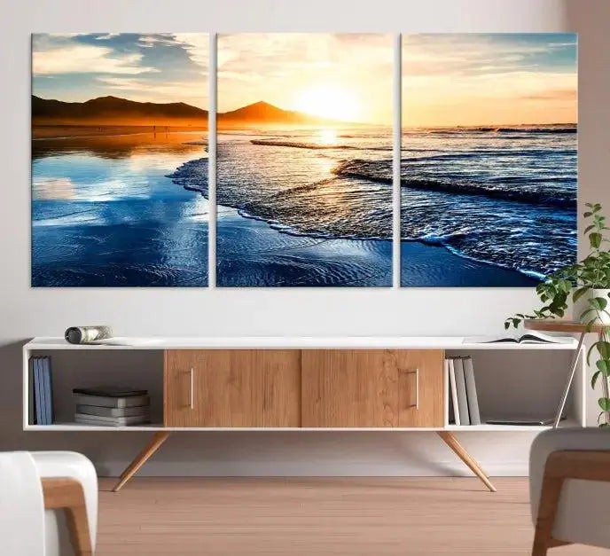 The Beach Ocean Sunset on the Sea Wall Art Canvas Print features a mesmerizing triptych of a beach sunset. Made from museum-quality polycotton canvas with a UV-protective coating, this ready-to-hang artwork will beautifully transform your space.