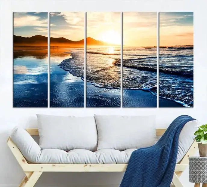 The Beach Ocean Sunset on the Sea Wall Art Canvas Print features a mesmerizing triptych of a beach sunset. Made from museum-quality polycotton canvas with a UV-protective coating, this ready-to-hang artwork will beautifully transform your space.