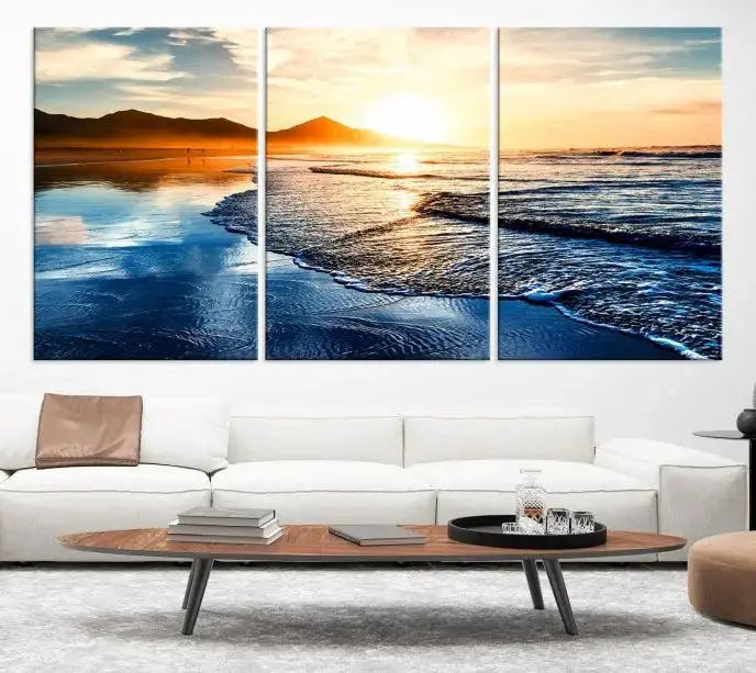 The Beach Ocean Sunset on the Sea Wall Art Canvas Print features a mesmerizing triptych of a beach sunset. Made from museum-quality polycotton canvas with a UV-protective coating, this ready-to-hang artwork will beautifully transform your space.