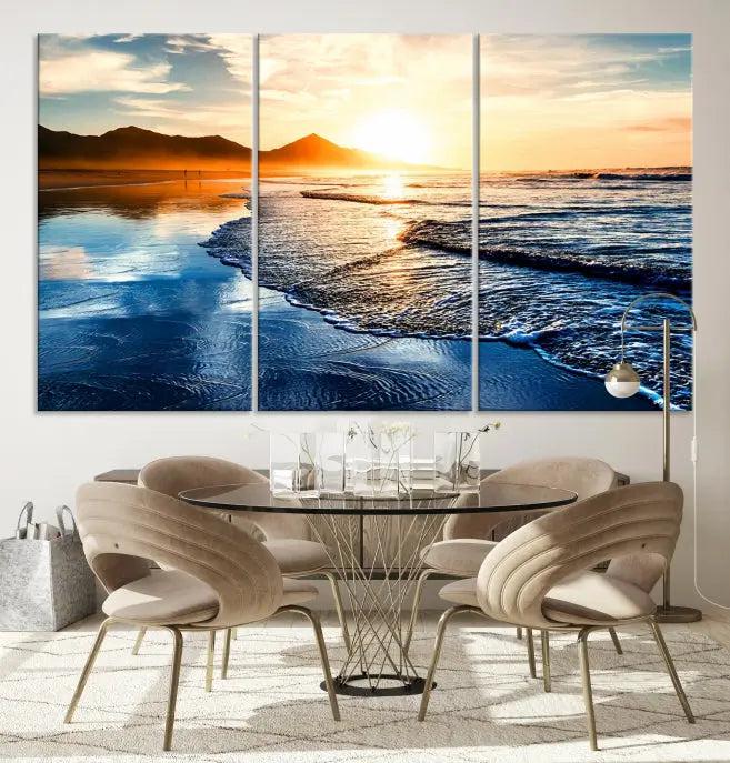 The Beach Ocean Sunset on the Sea Wall Art Canvas Print features a mesmerizing triptych of a beach sunset. Made from museum-quality polycotton canvas with a UV-protective coating, this ready-to-hang artwork will beautifully transform your space.