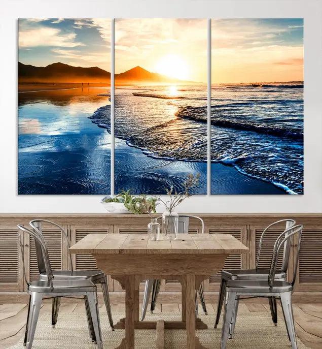 The Beach Ocean Sunset on the Sea Wall Art Canvas Print features a mesmerizing triptych of a beach sunset. Made from museum-quality polycotton canvas with a UV-protective coating, this ready-to-hang artwork will beautifully transform your space.