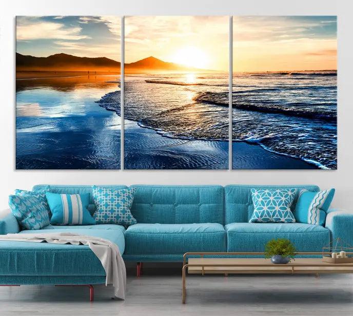 The Beach Ocean Sunset on the Sea Wall Art Canvas Print features a mesmerizing triptych of a beach sunset. Made from museum-quality polycotton canvas with a UV-protective coating, this ready-to-hang artwork will beautifully transform your space.