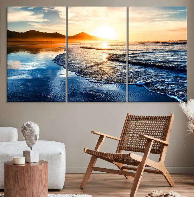 The Beach Ocean Sunset on the Sea Wall Art Canvas Print features a mesmerizing triptych of a beach sunset. Made from museum-quality polycotton canvas with a UV-protective coating, this ready-to-hang artwork will beautifully transform your space.