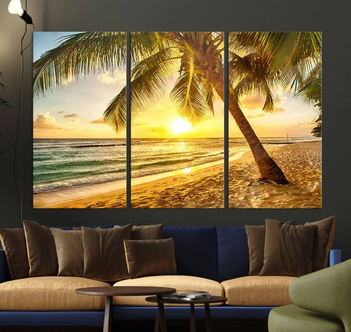 Beach Sunset Canvas Wall Art with a palm tree embellishes a living room with modern decor.