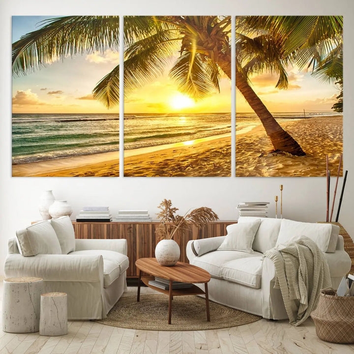 Beach Sunset Canvas Wall Art with a palm tree embellishes a living room with modern decor.