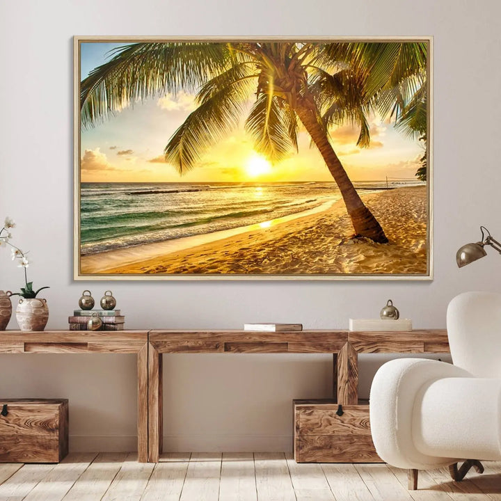 Beach Sunset Canvas Wall Art with a palm tree embellishes a living room with modern decor.