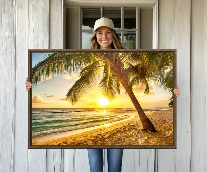 Beach Sunset Canvas Wall Art with a palm tree embellishes a living room with modern decor.