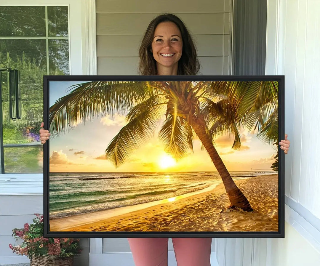 Beach Sunset Canvas Wall Art with a palm tree embellishes a living room with modern decor.