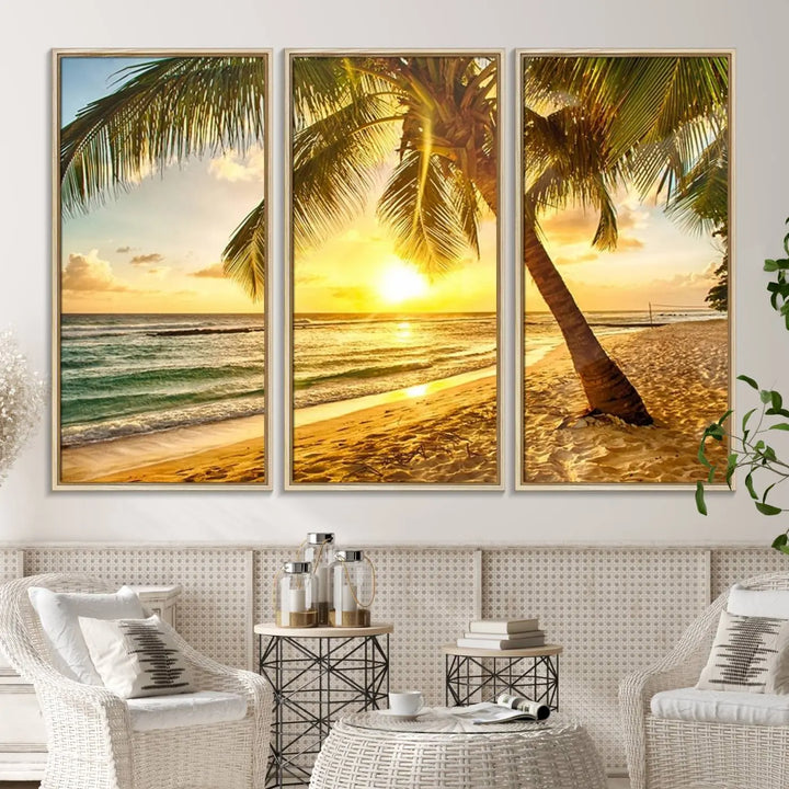 Beach Sunset Canvas Wall Art with a palm tree embellishes a living room with modern decor.