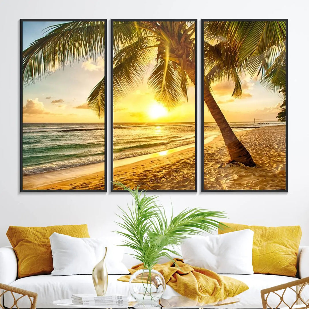 Beach Sunset Canvas Wall Art with a palm tree embellishes a living room with modern decor.