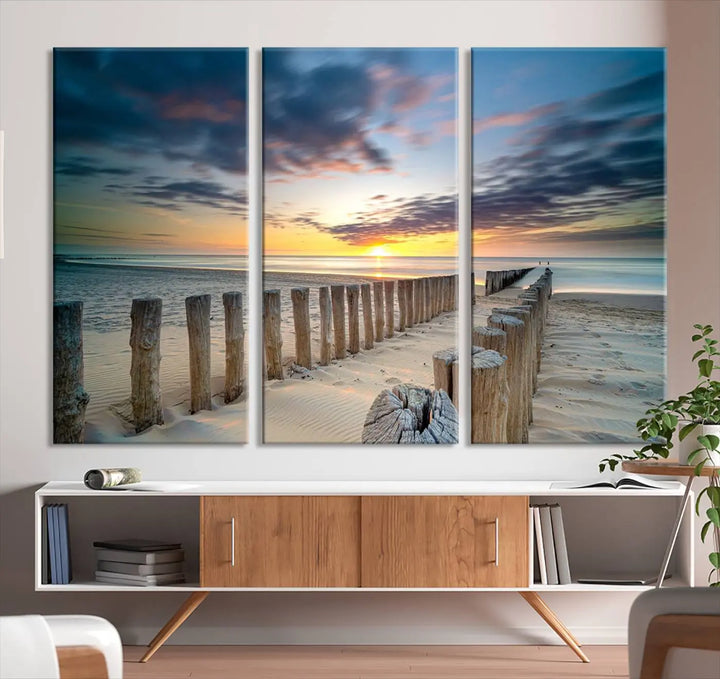 A museum-quality Beach Sunset Ocean Wall Art Canvas Print arranged as a triptych, depicting a tranquil beach sunset scene.