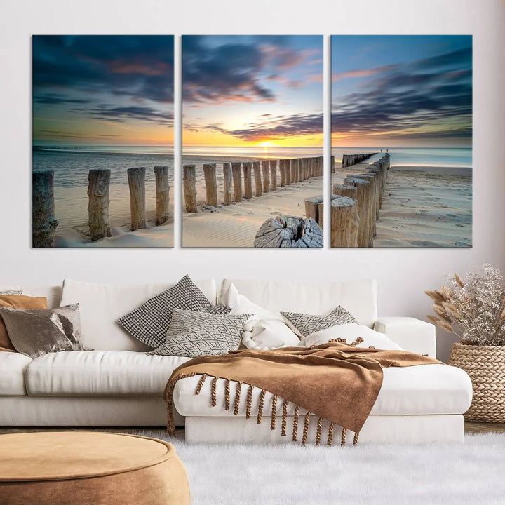 A museum-quality Beach Sunset Ocean Wall Art Canvas Print arranged as a triptych, depicting a tranquil beach sunset scene.