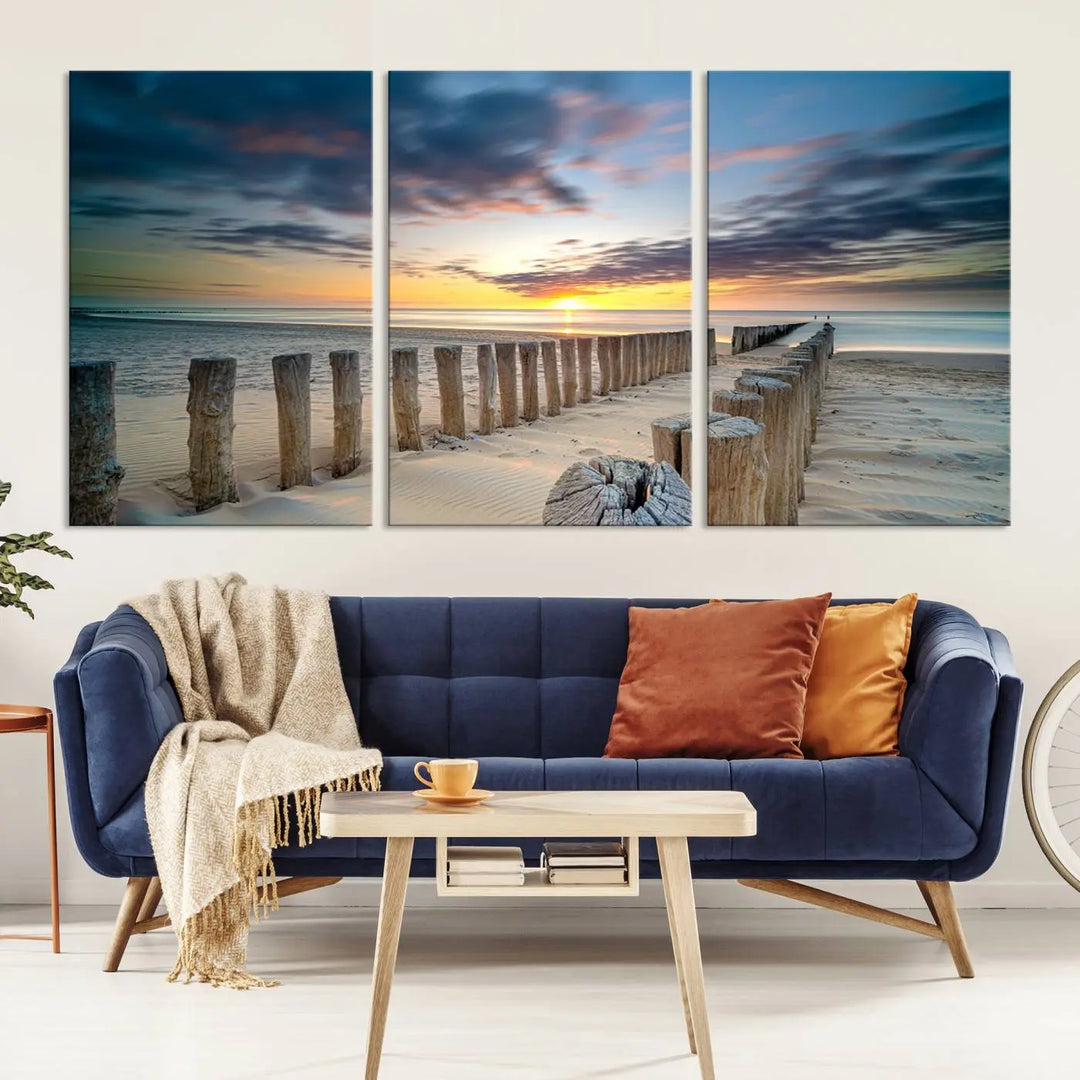 A museum-quality Beach Sunset Ocean Wall Art Canvas Print arranged as a triptych, depicting a tranquil beach sunset scene.