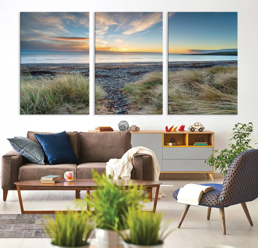 The living room features a Beach Sunset wall art canvas print gracing the wall, presented on museum-quality canvas with a UV-protective coating to ensure lasting vibrancy.