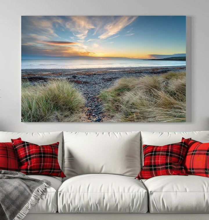 The living room features a Beach Sunset wall art canvas print gracing the wall, presented on museum-quality canvas with a UV-protective coating to ensure lasting vibrancy.