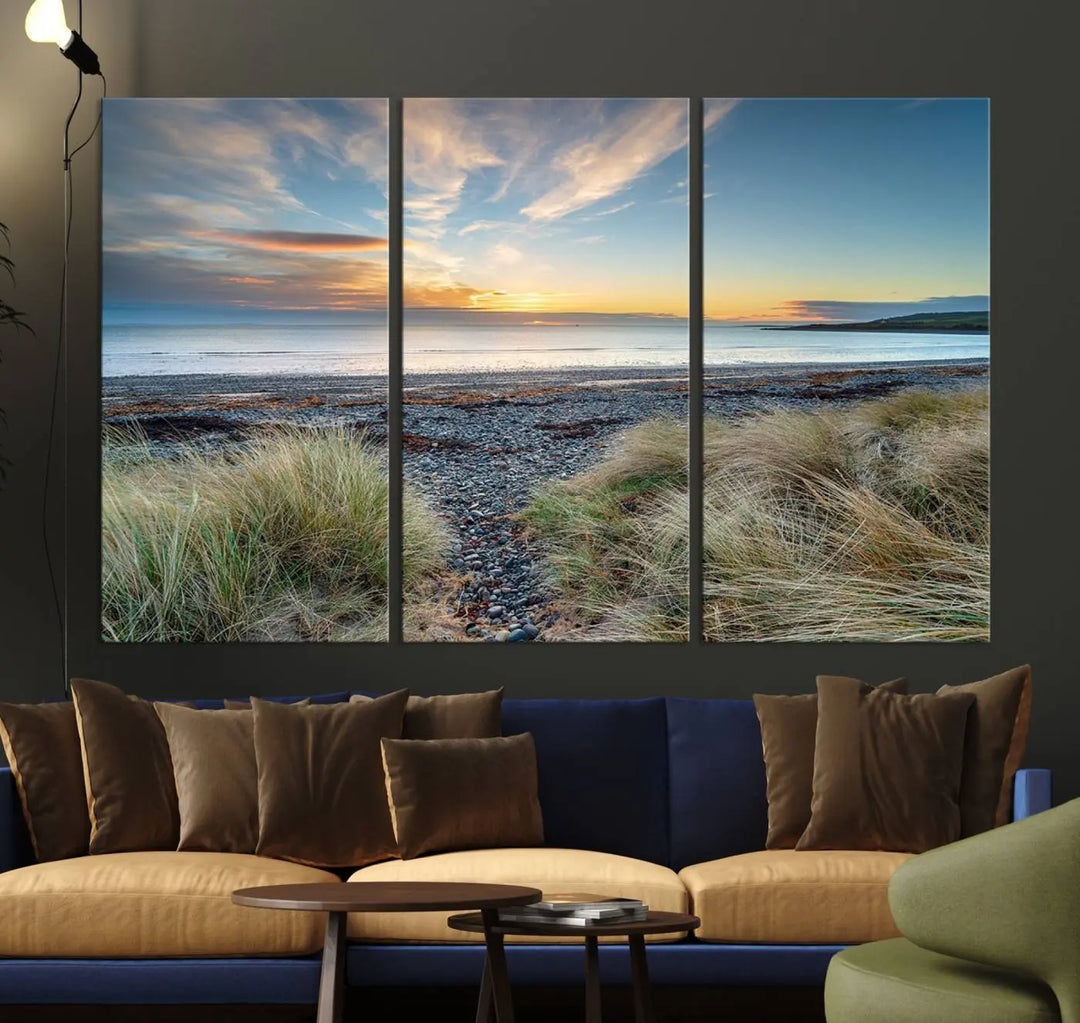 The living room features a Beach Sunset wall art canvas print gracing the wall, presented on museum-quality canvas with a UV-protective coating to ensure lasting vibrancy.