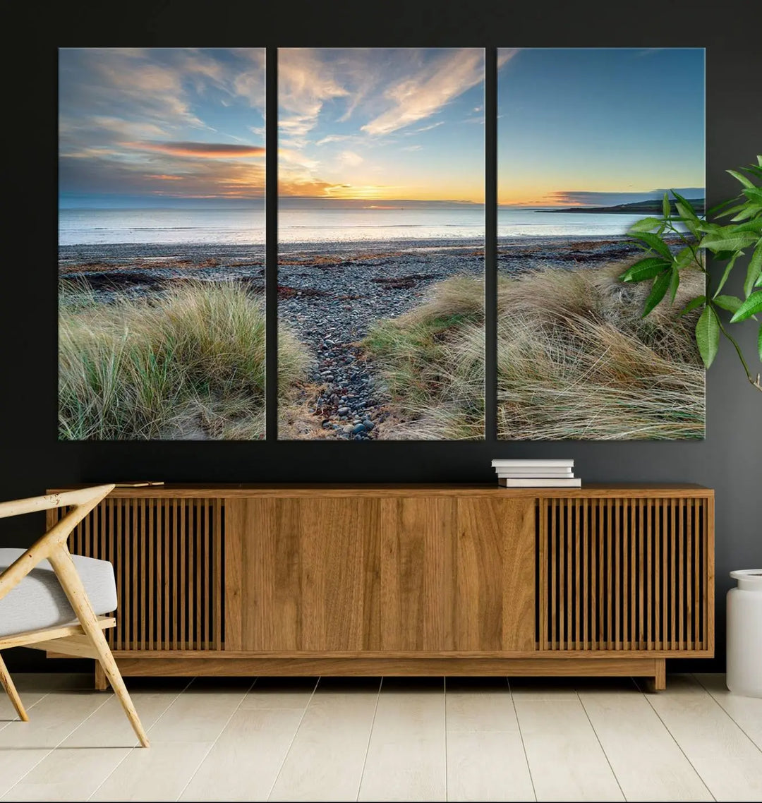 The living room features a Beach Sunset wall art canvas print gracing the wall, presented on museum-quality canvas with a UV-protective coating to ensure lasting vibrancy.