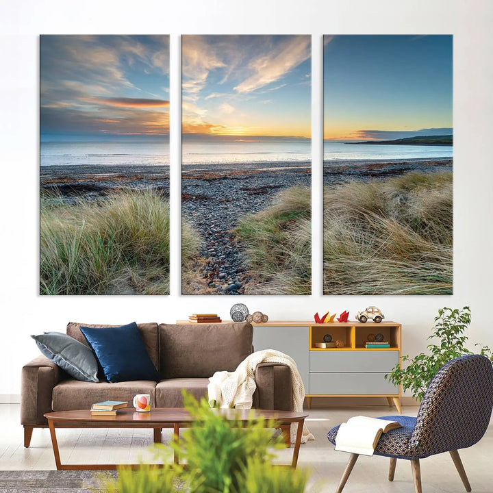 The living room features a Beach Sunset wall art canvas print gracing the wall, presented on museum-quality canvas with a UV-protective coating to ensure lasting vibrancy.