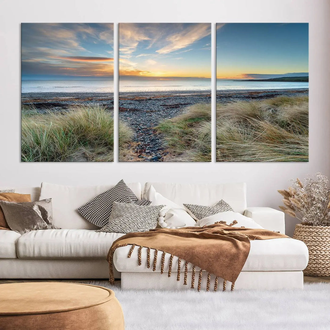 The living room features a Beach Sunset wall art canvas print gracing the wall, presented on museum-quality canvas with a UV-protective coating to ensure lasting vibrancy.