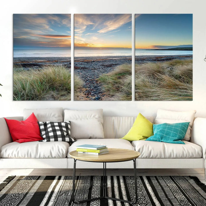 The living room features a Beach Sunset wall art canvas print gracing the wall, presented on museum-quality canvas with a UV-protective coating to ensure lasting vibrancy.