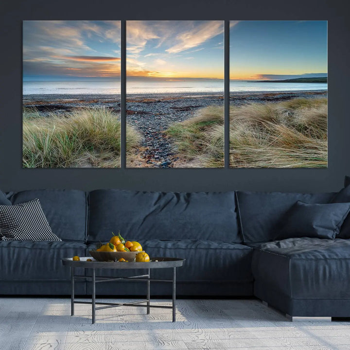 The living room features a Beach Sunset wall art canvas print gracing the wall, presented on museum-quality canvas with a UV-protective coating to ensure lasting vibrancy.