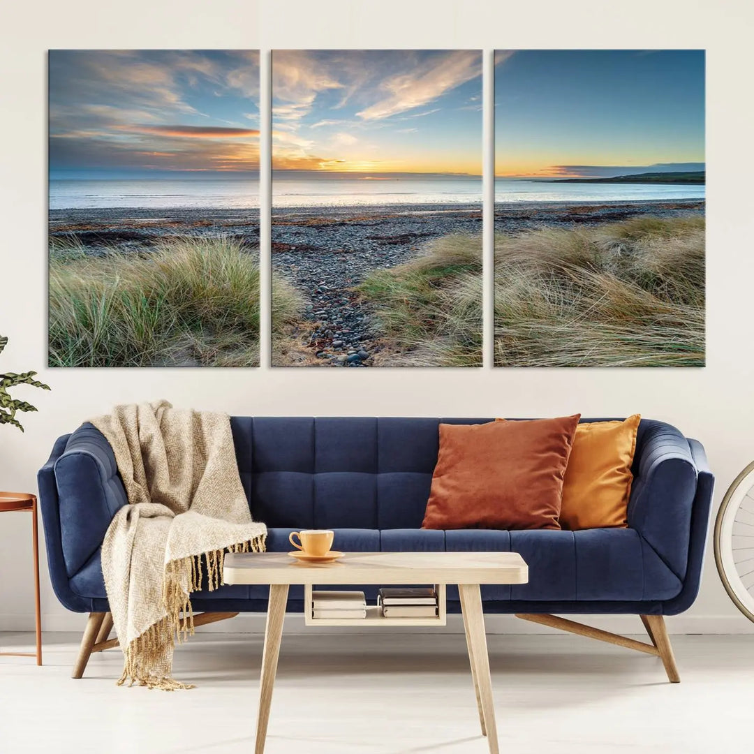 The living room features a Beach Sunset wall art canvas print gracing the wall, presented on museum-quality canvas with a UV-protective coating to ensure lasting vibrancy.