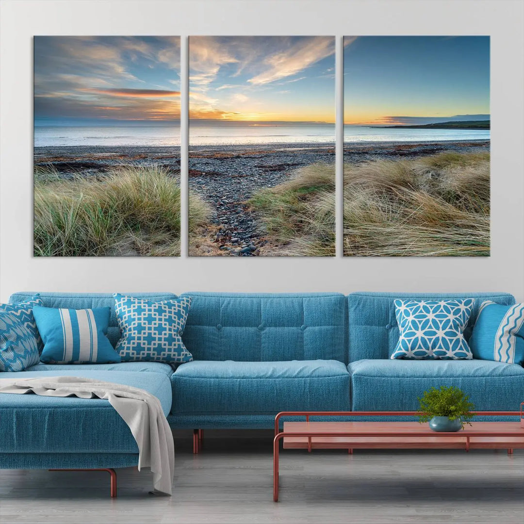 The living room features a Beach Sunset wall art canvas print gracing the wall, presented on museum-quality canvas with a UV-protective coating to ensure lasting vibrancy.