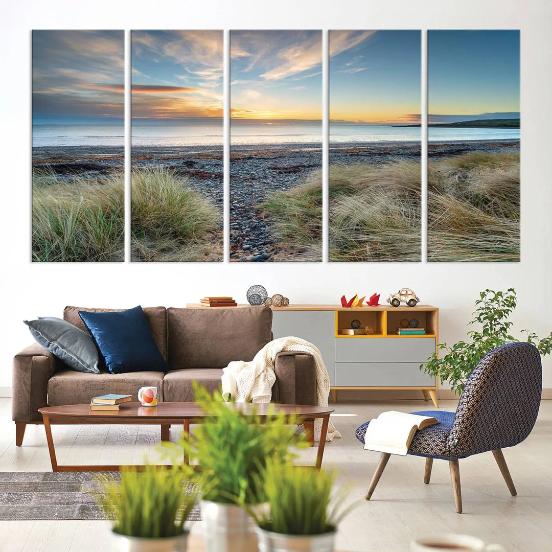 The living room features a Beach Sunset wall art canvas print gracing the wall, presented on museum-quality canvas with a UV-protective coating to ensure lasting vibrancy.